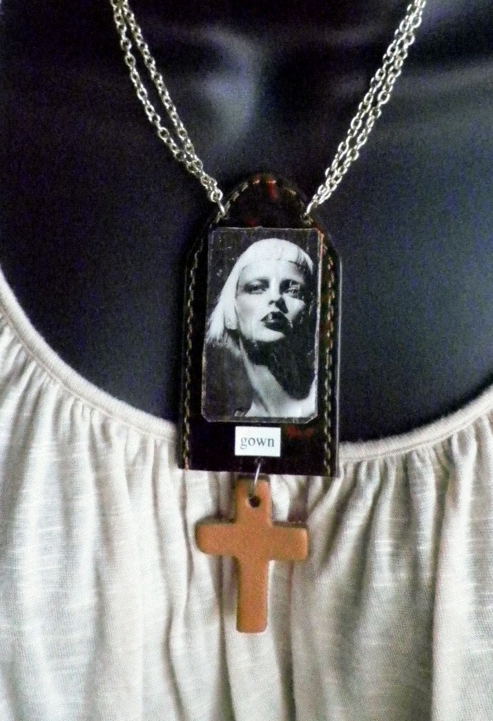 Assemblage upcycled rocker chic layered piece with high fashion image