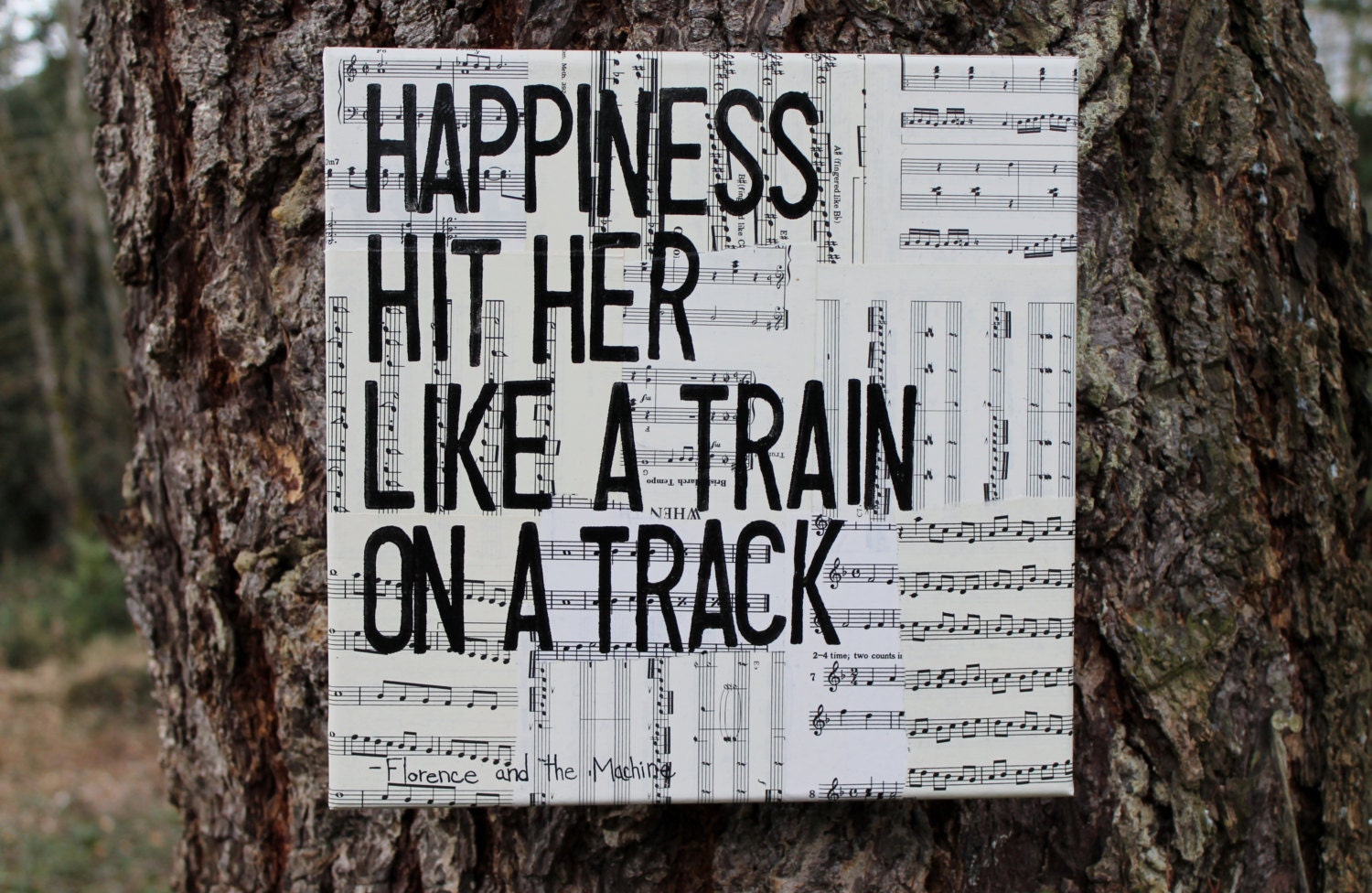 12x12 "Happiness hit her like a train on a track"  Dog days - Lyrics from Florence and the Machine - Vintage music sheet canvas art