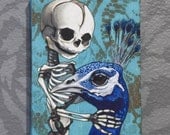 Fetal skeleton with peacock friend on gallery wrapped canvas.