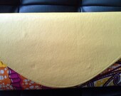 Mustard leather and multiprint ankara clutch by Gitas PORTAL