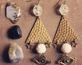 mystic.  a pair of geometric star and third eye earrings.