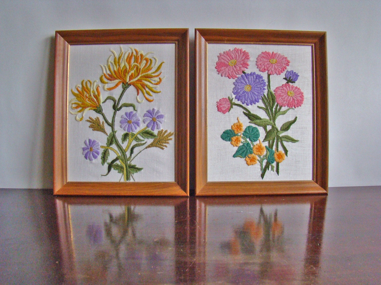 pair of vintage framed floral crewelworks by Paragon Needlecraft