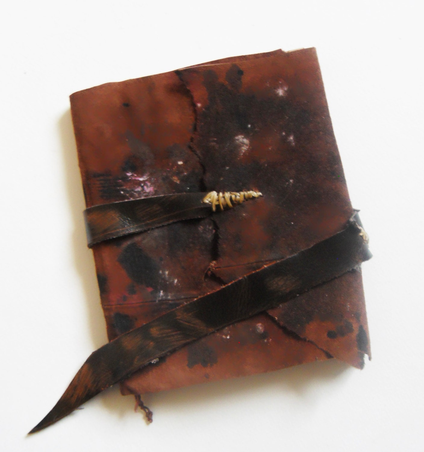 Antiqued crude stained art journal. Handbound leather aged, burnt pages. 6x6 inches. Dark brown with white and black splatters
