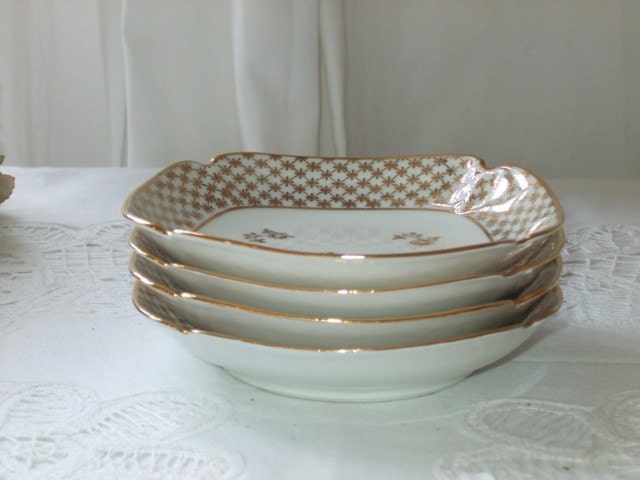 Vintage French Limoges porcelain set of four  dessert dishes, plates .  Paris apartment cottage chic.