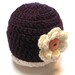 Crochet newborn girls hat with flower.  Ready to ship.  Newborn photography prop hat with flower.  Purple and cream.