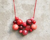 Red bib necklace, bead necklace, chunky, chevron, wooden bead, nectarine, oxblood, dark red, boho, funky, woven bead necklace.