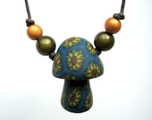 Mushroom pendant, millefiori sunflowers, really cute, handmade from polymer clay with miracle beads on thin adjustable cord