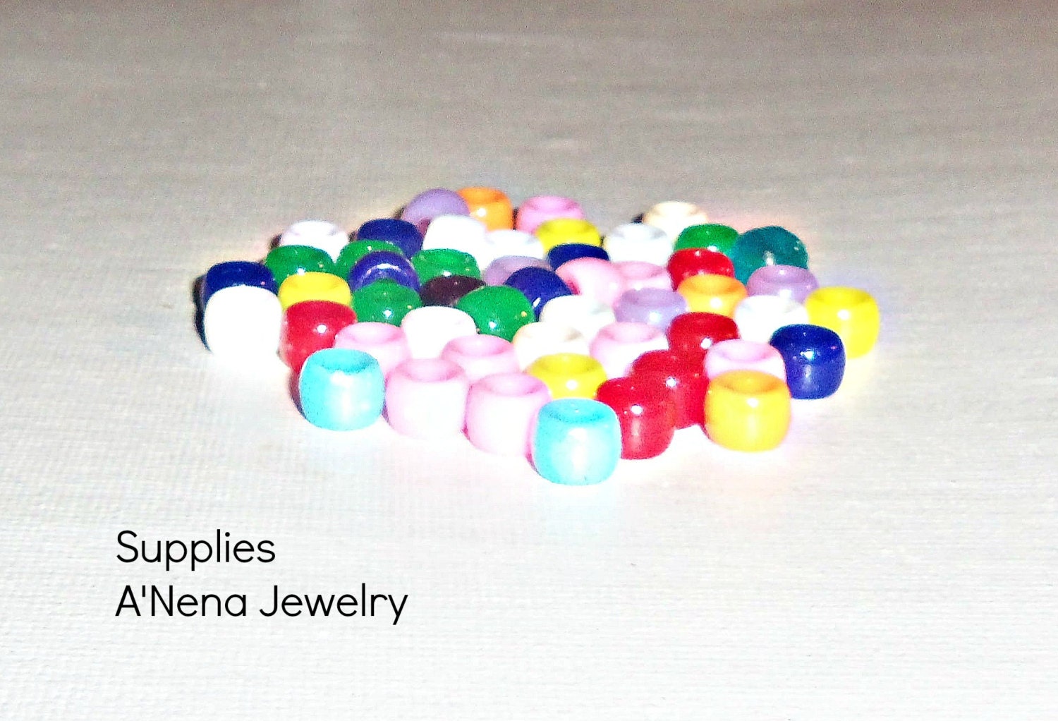 A Bag of 30 Plastic Assorted Color Beads for Only 7