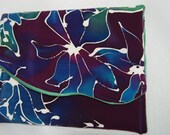 Toast of Sapphire (CL 7) is a hand painted silk clutch with a beautiful contrasting hand dyed, green silk lining.