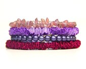 Purple bracelets, a set of stackable bracelets in shades of purple, beaded bracelets and ribbon bracelets