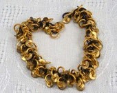 Shaggy chainmaille bracelet, brass and dark brown aluminum with brass discs