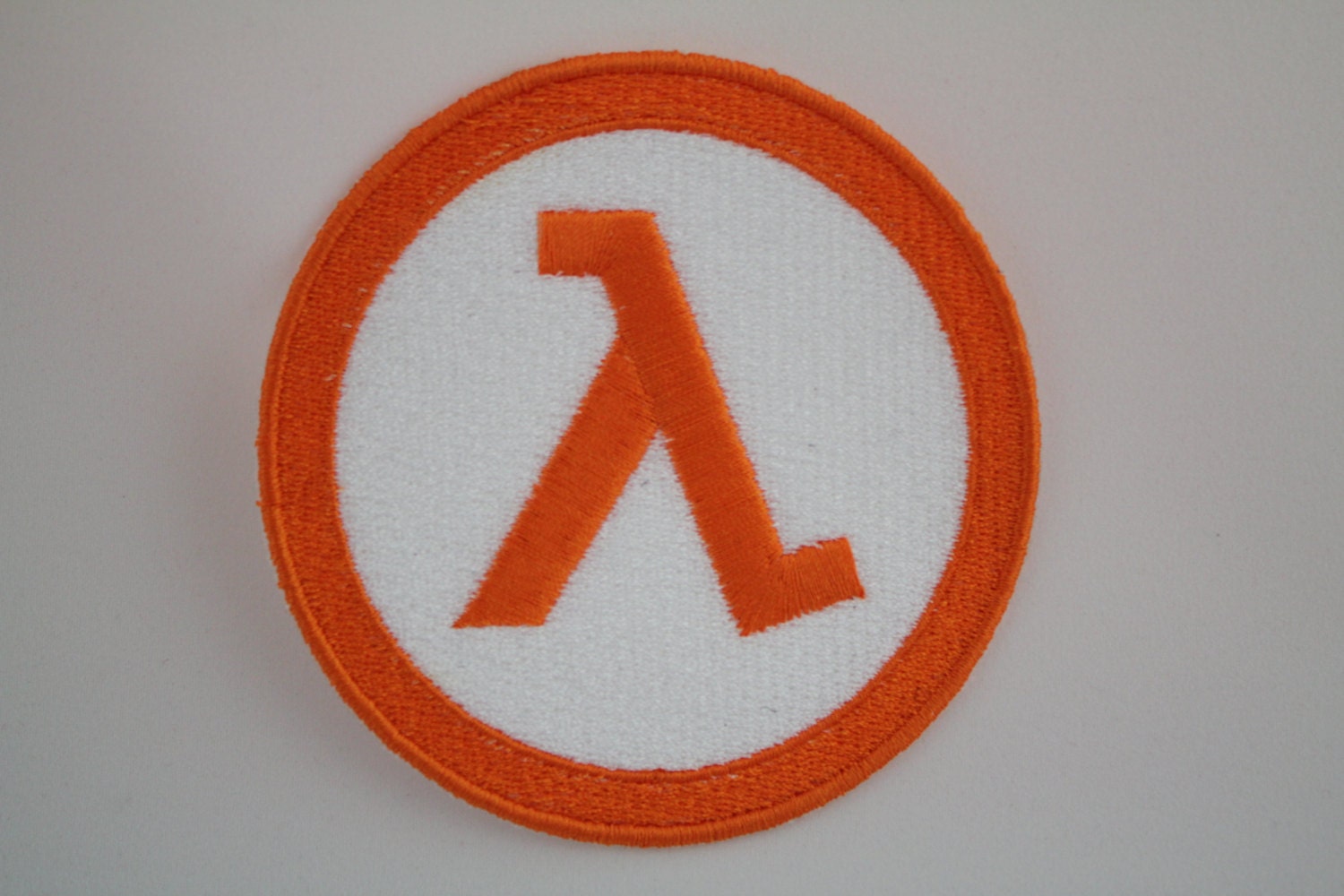 Lambda Symbol from Half Life