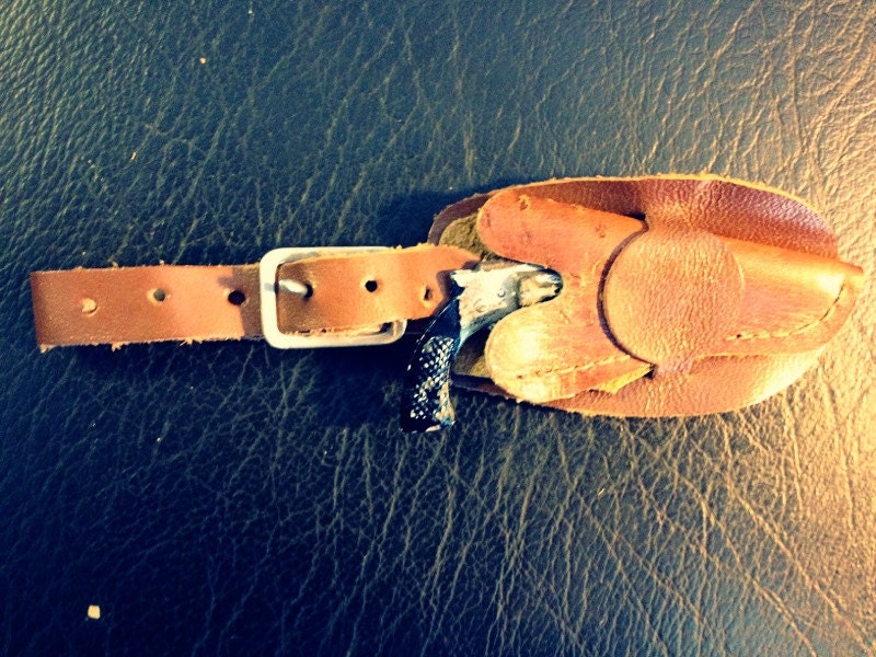 vintage toy diecast gun in western leather belted key chain , children's