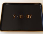 L gold date  black tray