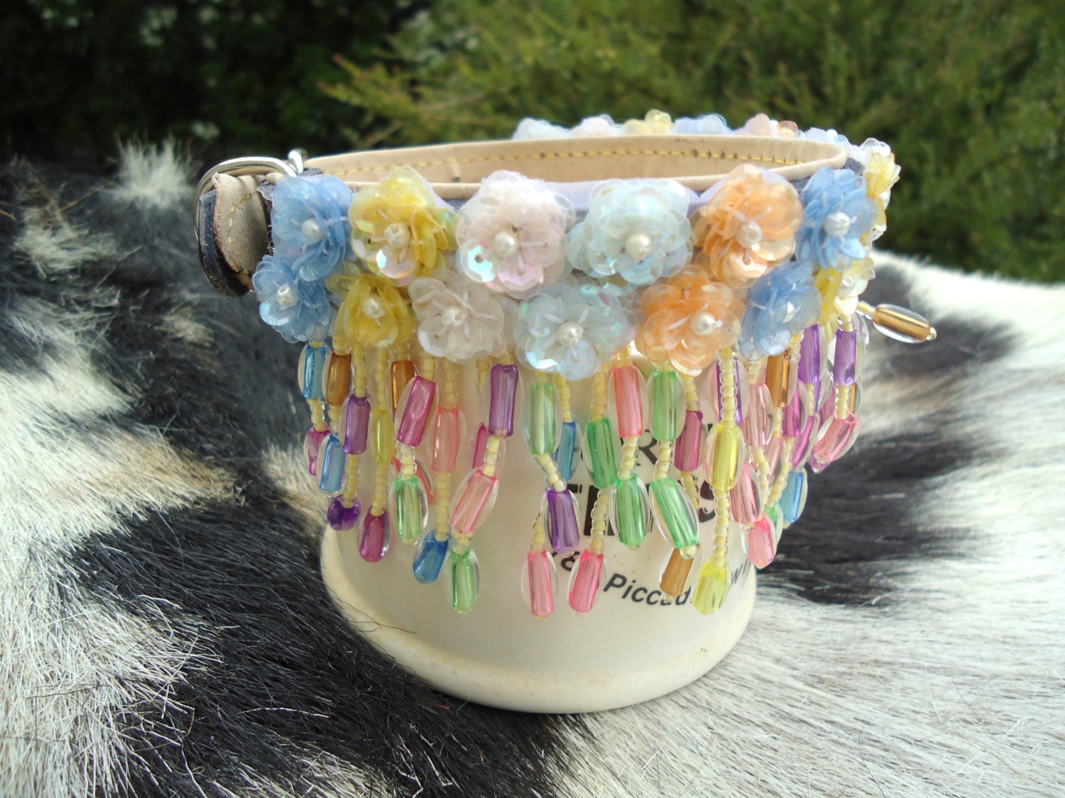 Pastel glass bead surround with multi color bead drop.