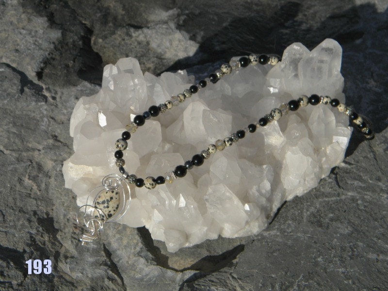 Dalmation Jasper wire sculpted with black onyx crystals hematite pewter bead necklace.