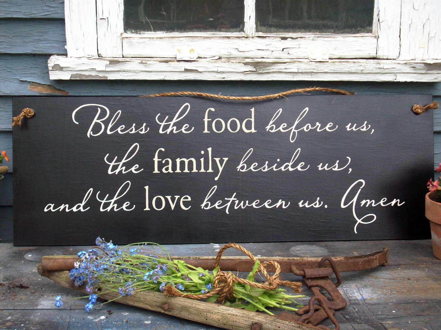 Bless the food before us, the family beside us, and the love between us. Amen 12 X 34 1/4'' wood sign