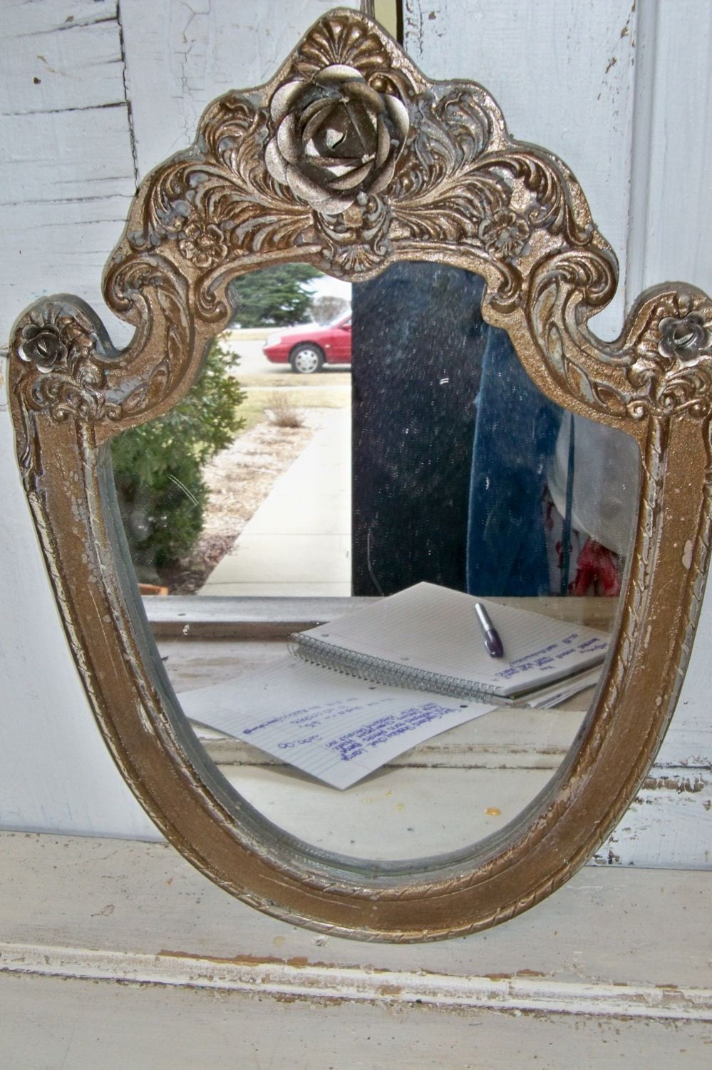 Ornate wooden wall mirror bronze and metals French farmhouse accented with metal rose anita spero