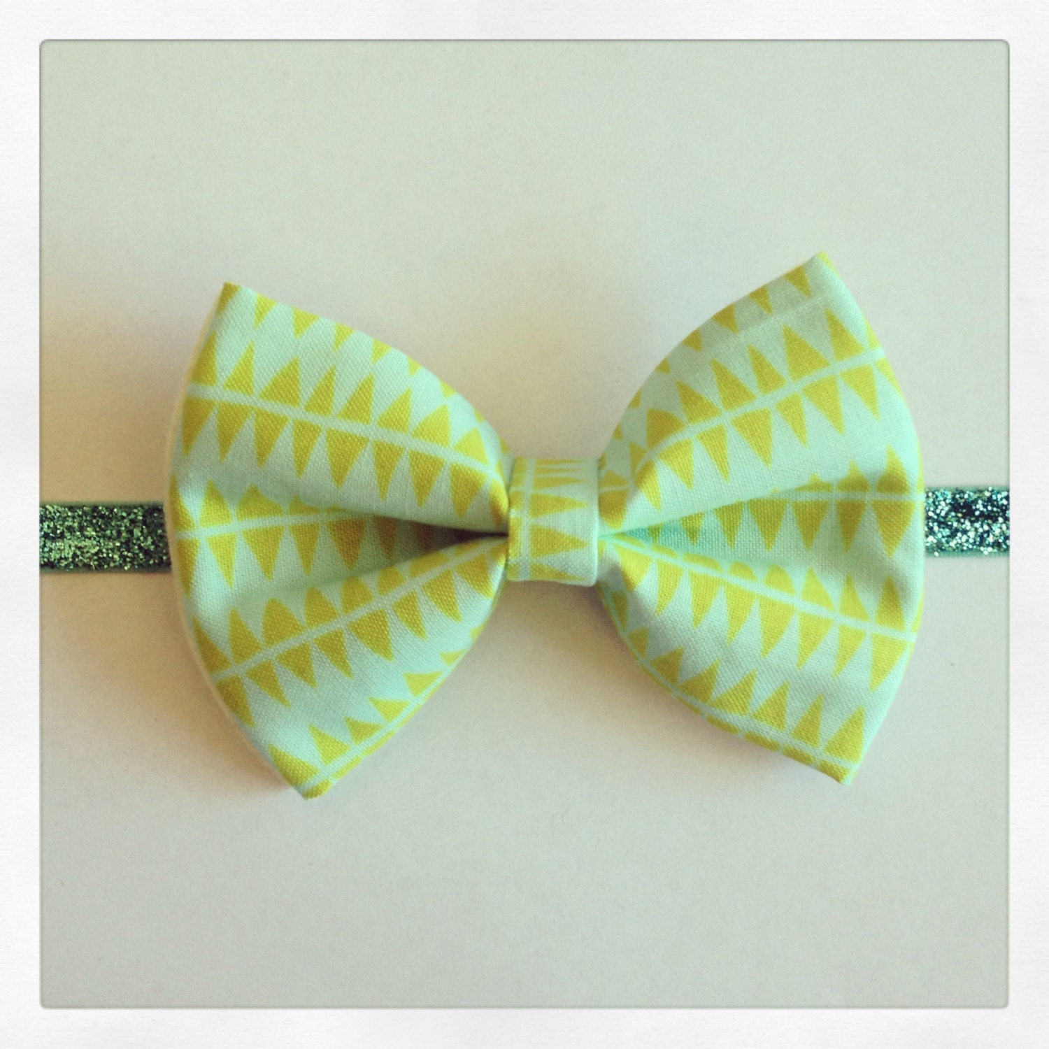 Baby bow-Aztec arrow inspired fabric and wool felt bow headband