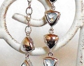 Rhodium plated Sterling Silver Trillion Sky Blue Topaz Bracelet