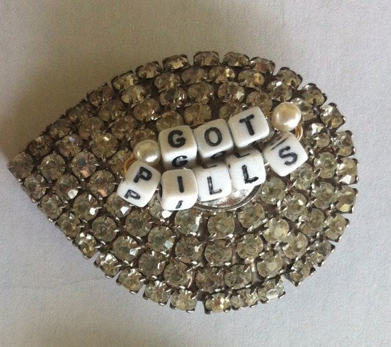 Teardrop-Shaped Vintage Rhinestone Pin with "Got PIlls" Words