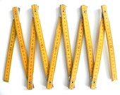 Vintage yellow wooden measuring tape / collapsing ruler / meter stick