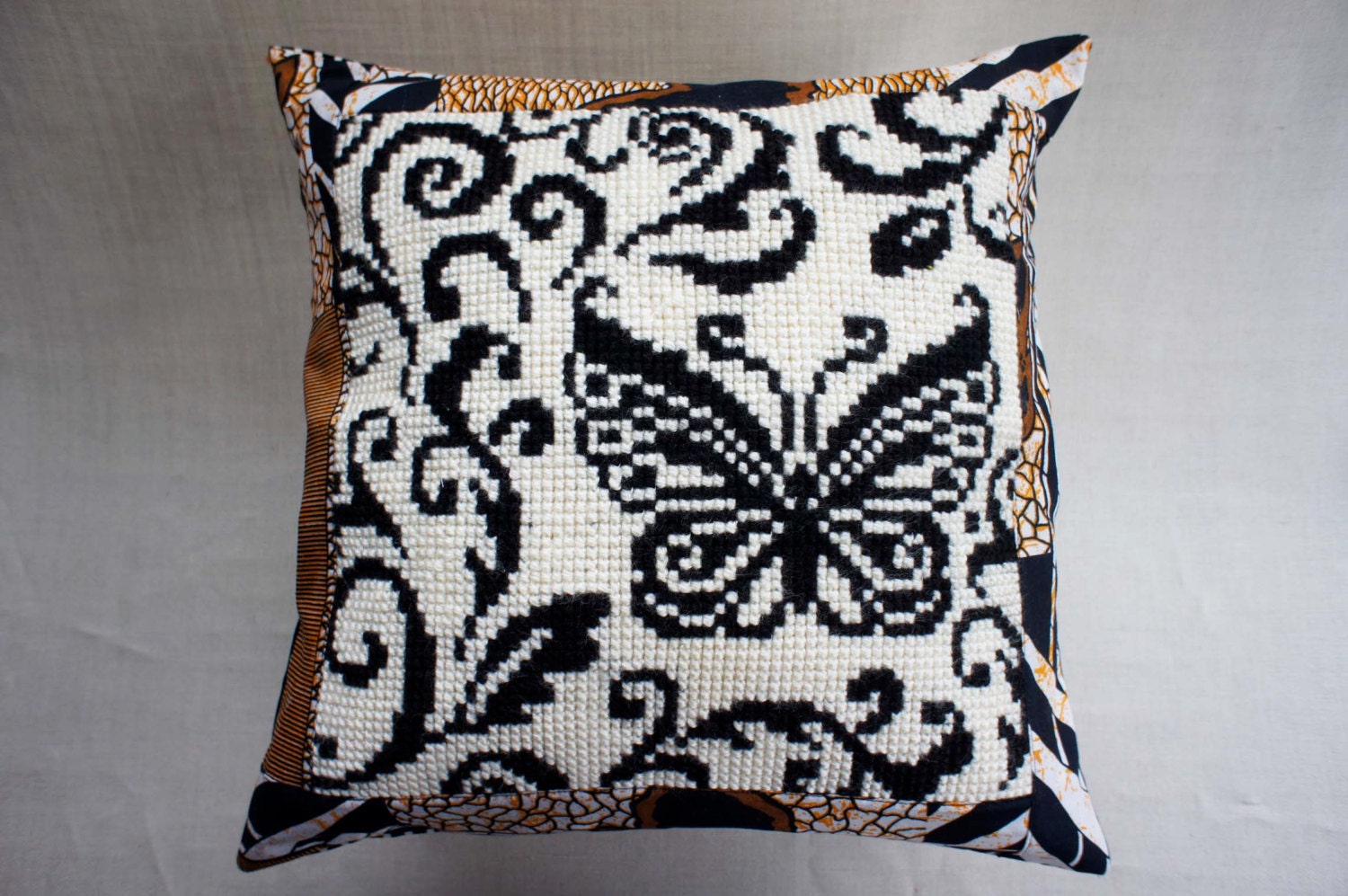 Butterfly in black and white, pillowcover, vintage needlework, African waxprint, black and white striped velvet back