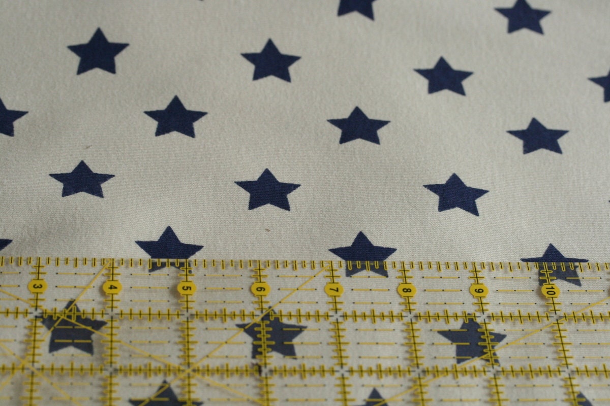One metre organic cotton jersey blue stars on grey