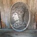Vintage silver cameo style wall plaque, Warrior Goddess in medieval dragon helmet