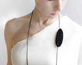Black asymmetric necklace/brooch made of rice