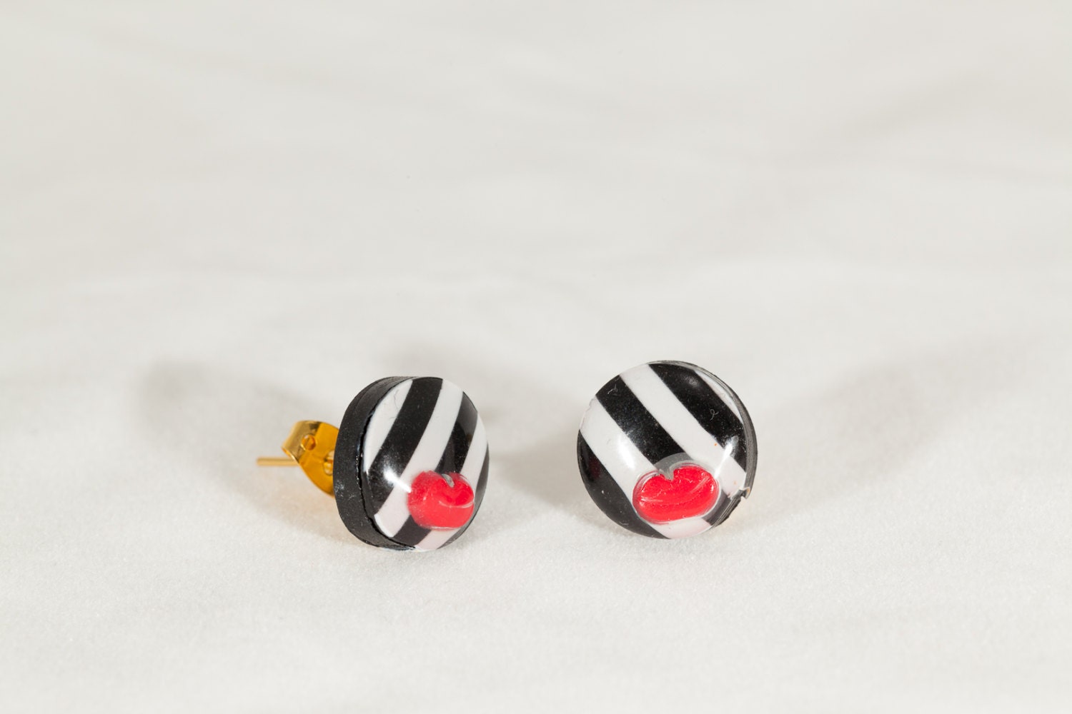 Black and white studs, handmade earstuds in black and white,  polymer clay stripes with red mouth