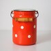 Vintage enamel milk can
