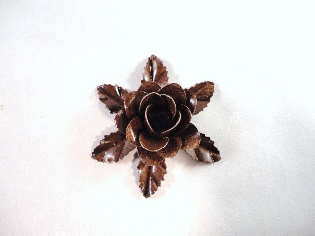Small Size Decorative Metal Hand Cut and Hand Painted Rustic Chocolate Burnt Brown Rose Mounted on a Bed of Metal Leaves.
