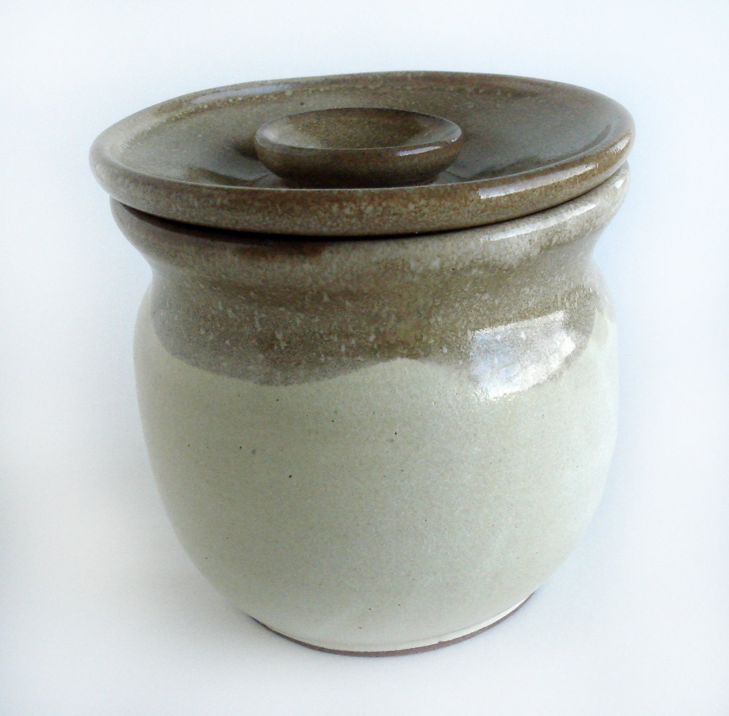 Stoneware kitchen canister or salt cellar: cream and tan pottery