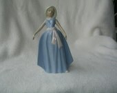 porcelian figurine very dainty and would fit in any home decor