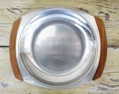 Vintage serving tray/bowl.   Danish Modern Gabis mid century stainless serving bowl/tray with wood handles.