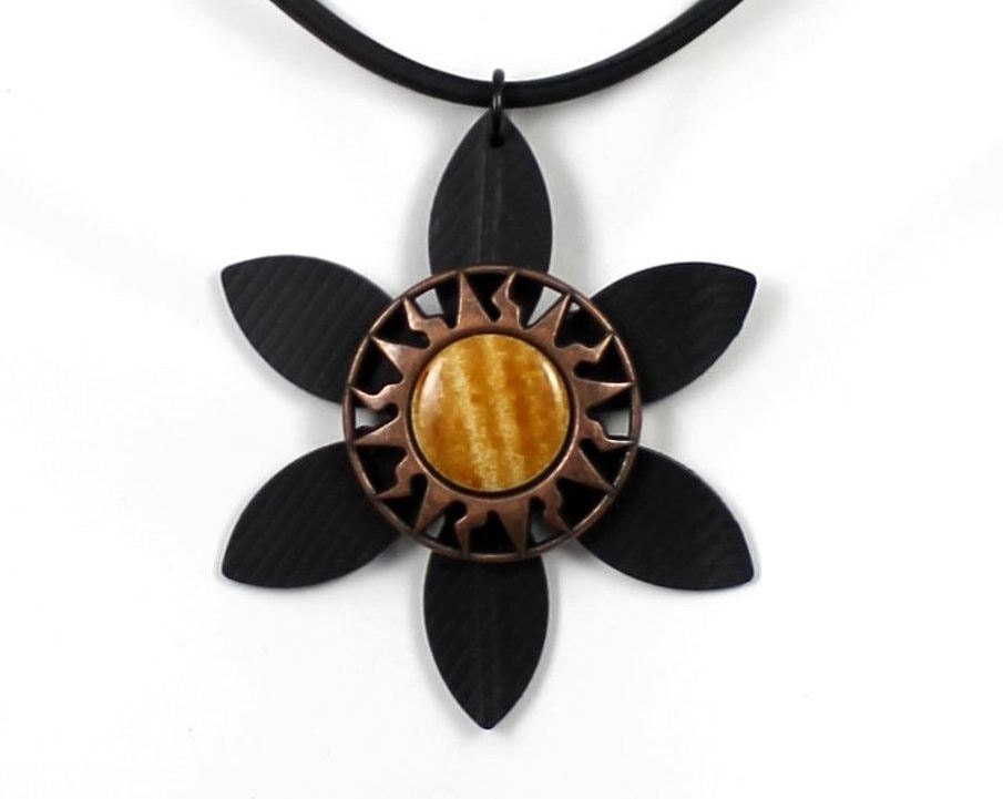Recycled Bike Tire Inner Tube Daisy Flower Necklace with Plastic Caramel / Copper-colored Sun - Hangs on Rubber Cord - Upcycled Bike Jewelry