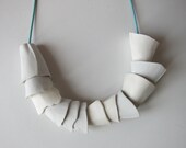 Pieces of Porcelain: Unique handmade medium size porcelain skeleton necklace, white and slightly bluish chimney-like pieces