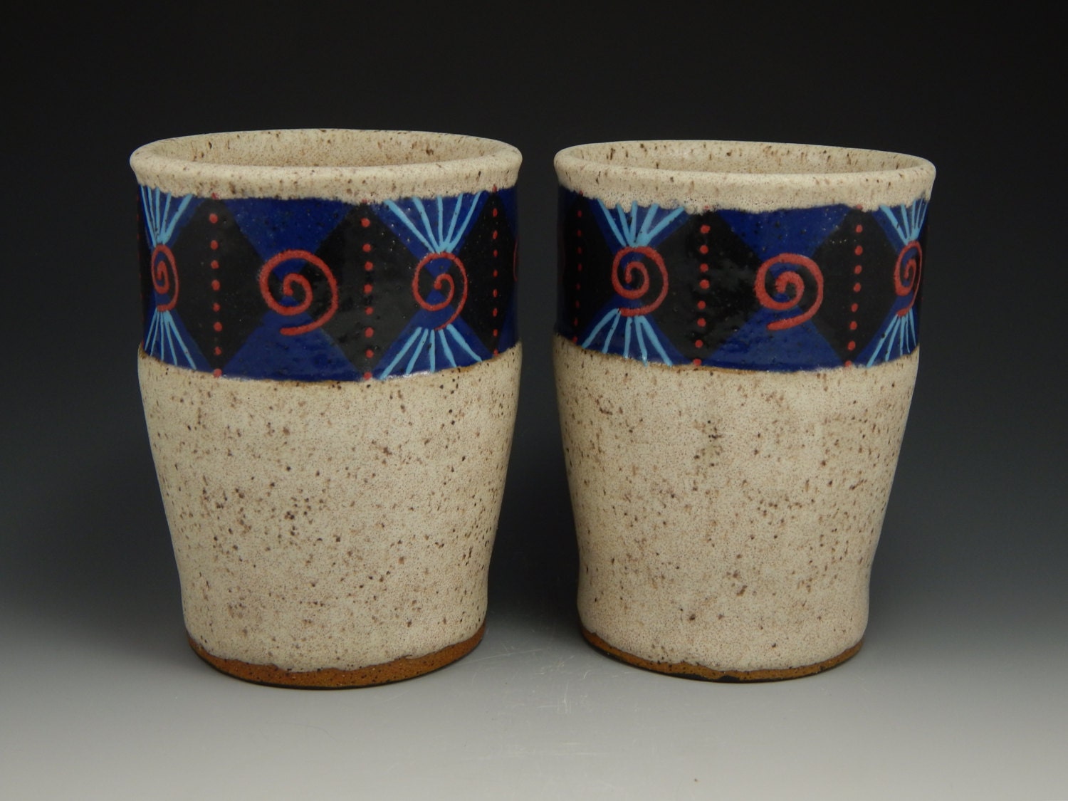 ceramic tumblers, white, blue, wheel thrown