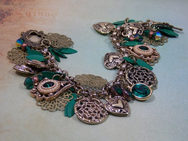 Emerald Green chunky charm bracelet with antique gold undertones, Emerald green tear drop charms, antique gold, heart shaped filigee charms