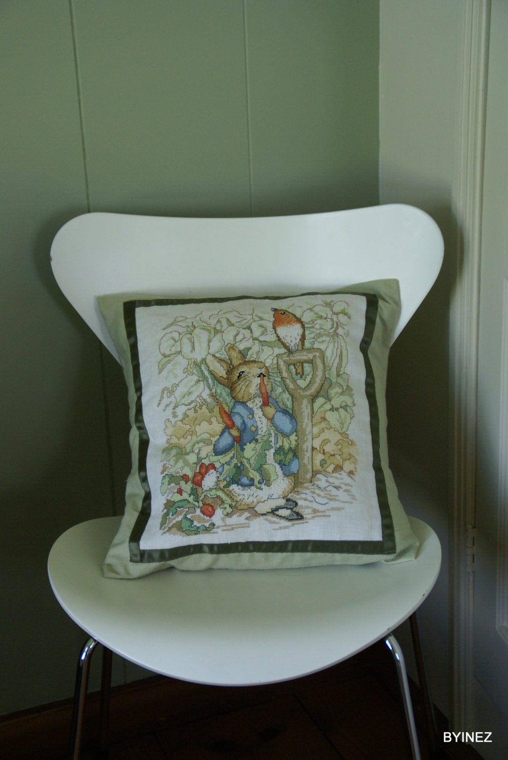 children cushion cover with needlepoint embroidery Beatrix Potter, soft green