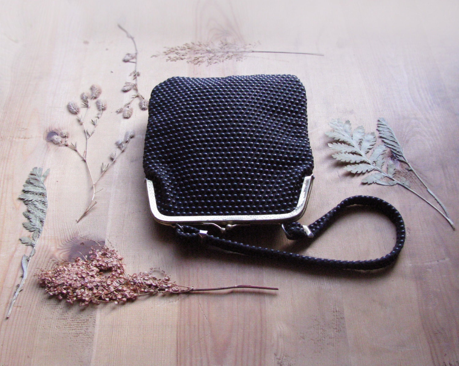 Vintage black clutch handbag with 3d dots, vintage fashion from 60s