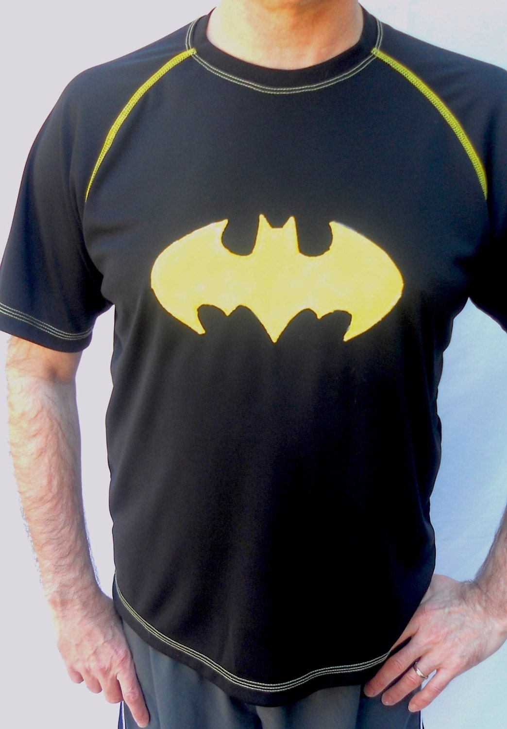 Batman inspired running top for him with wrist bands