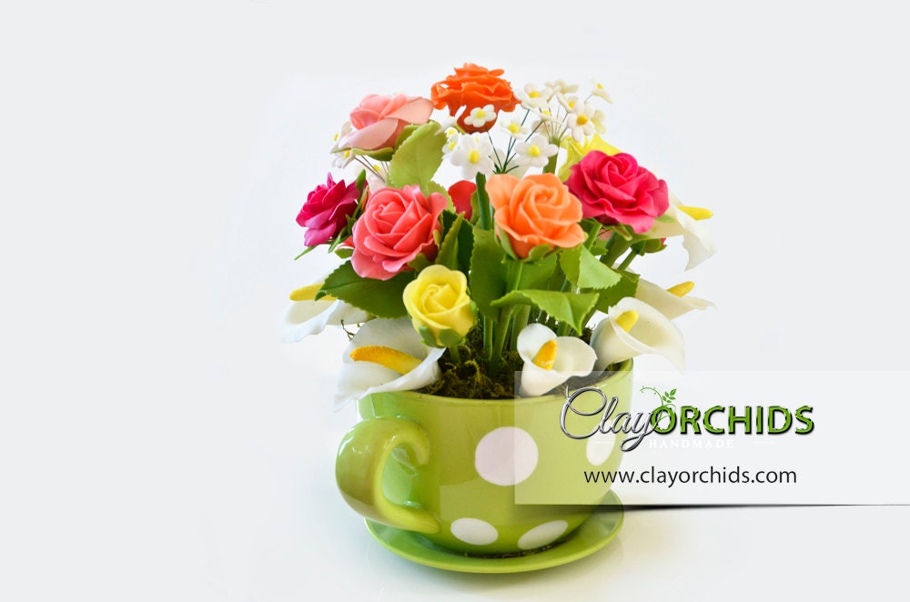 A Beautiful real size rose handcrafted from polymer air dry clay and hand paint with oil color.