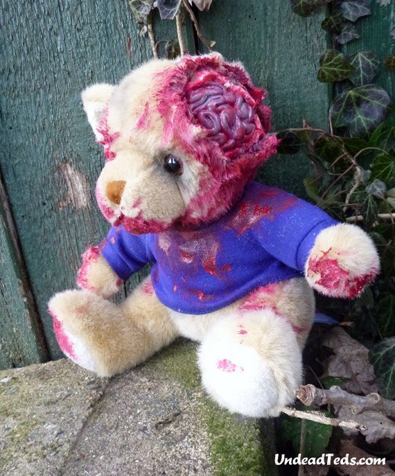 Sitting UnDead Ted with exposed brain and eyesocket.