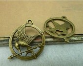 on sale -10pcs 25mm Antique bronze Lovely Smaller Bird Arrow Mocking Jay Hunger Game Hometown Tag Sign Charm Pendant