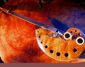 Handmade musical string instrument. The Root.