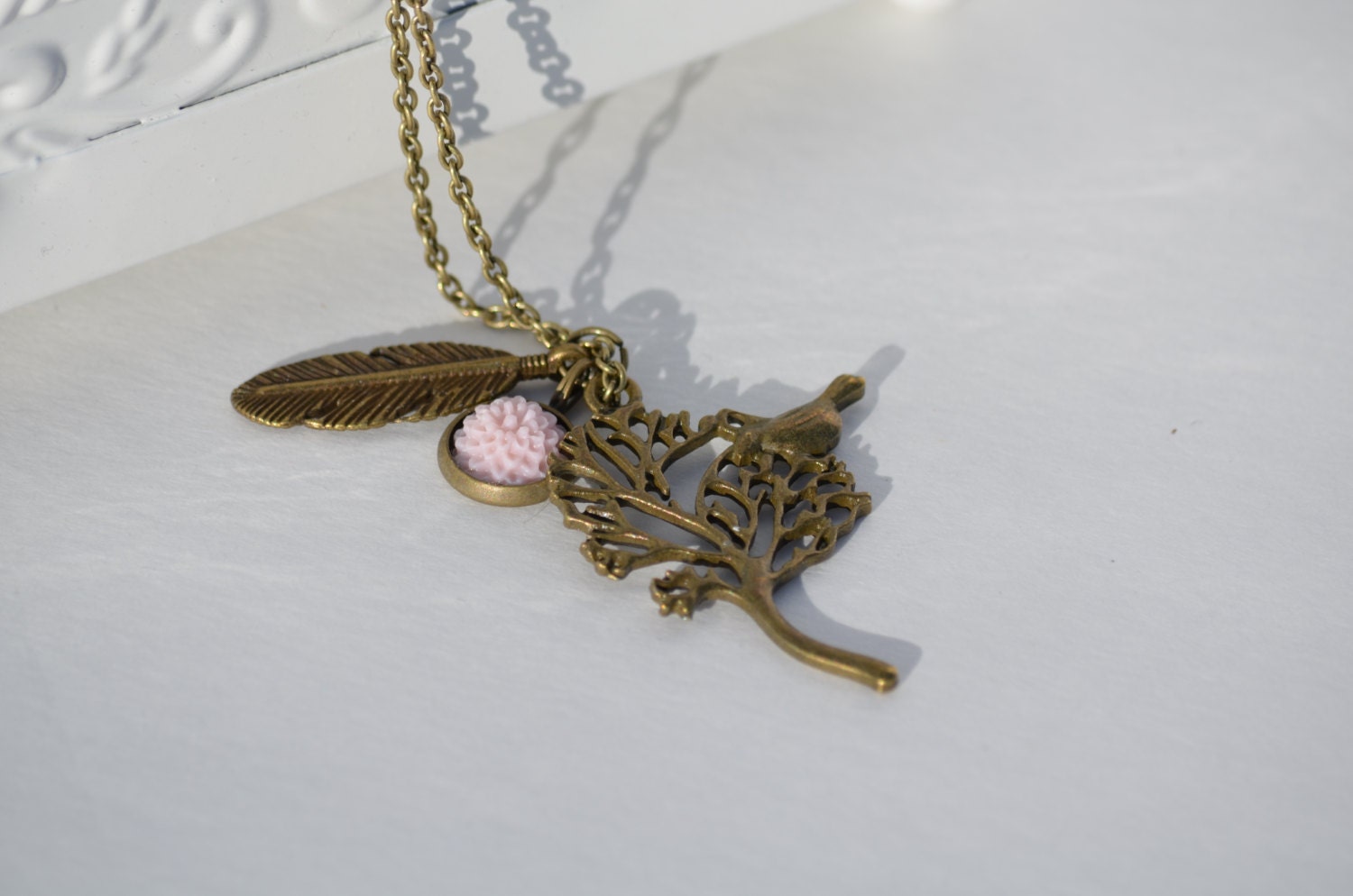 Antique Finish Necklace with a Bird in Tree Charm, Feather and Flower Charms, Light Pink Resin Flower