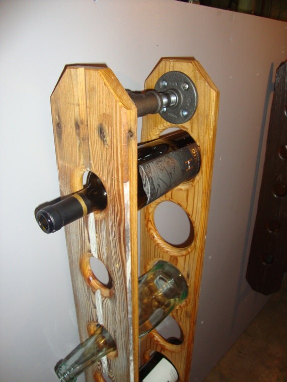 Items similar to 7 Bottle handmade wine rack from repurposed flooring