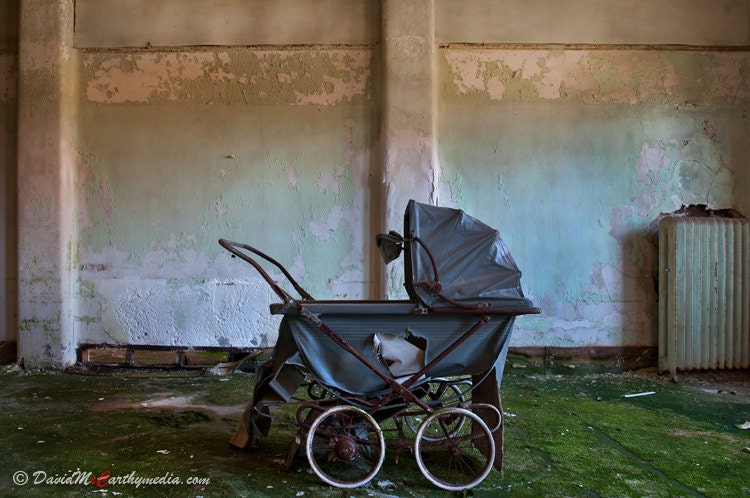 Abandoned Baby Carriage - An original 8x12 photograph of a baby carriage taken by me inside an abandoned mental hospital.